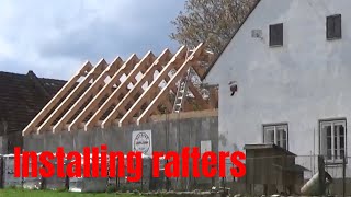 Installing the rafters on the new roof [upl. by Rramel]