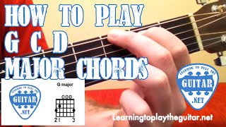 How To Play G C D Major Chords  Learning To Play The Guitar [upl. by Hertzfeld]