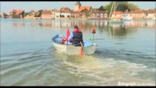 Self confessed nutter invents weird amphibious craft made from a lawnmower and a sailing boat [upl. by Annala]