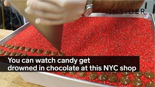 You can watch candy get drowned in chocolate at this NYC shop [upl. by Nerehs653]