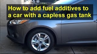 How to add fuel injector cleaner to a car with a capless fuel tank  VOTD [upl. by Yniattirb]