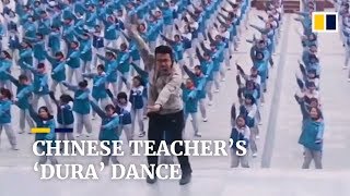 Chinese teacher’s ‘Dura’ dance with hundreds of students [upl. by Llertniuq]