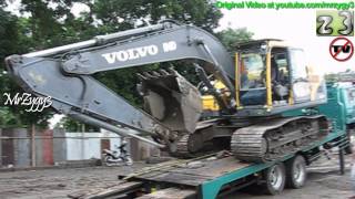 Mitsubishi Fuso Unloading Excavator Volvo EC210B [upl. by Anirbak822]