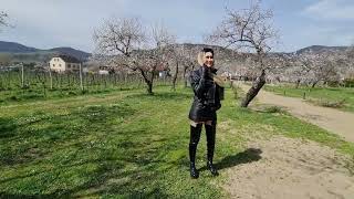 Granate Styling walking outdoor in flourishing appricot plantation crotch high bootshigh heels [upl. by Markland]