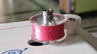 How to load a thread in bobbin case in Singer 8280 Table top machine saisashmithaaricreative [upl. by Eirovi]