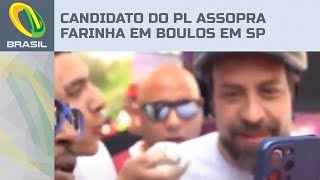 Candidato do PL a vereador assopra farinha em Guilherme Boulos durante ato em São Paulo [upl. by Ainola]