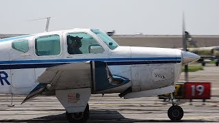 1960 Beech M35 Bonanza  Landing at Republic Airport FRG [upl. by Naruq]