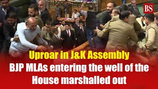 Uproar in JampK Assembly BJP MLAs entering the well of the House marshalled out [upl. by Ettecul]