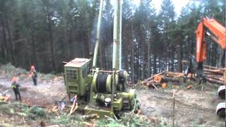 Terex 8230 Sidewinder Yarder amp Hitachi EX300LCLL3 heelboom log loader [upl. by Yeknarf961]