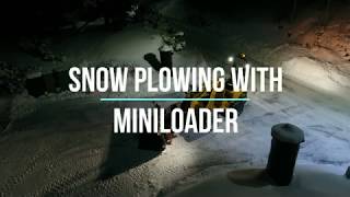 Mini loader snow plowing [upl. by Athalla]