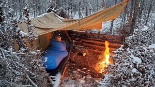 Winter Camping in Snow Storm with Survival Shelter amp Bushcraft Cot [upl. by Ecnarepmet]