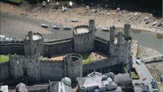 Caernarfon Castle Wales  Visit Britain  Unravel Travel TV [upl. by Uhthna]