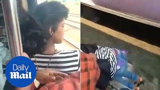 Careless teenager inches from death rescued by train passengers [upl. by Mureil856]