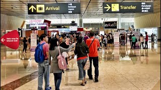 Heavy rain prompts flood warnings for many areas of Singapore delays at Changi Airport [upl. by Aziar]