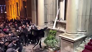 Protesters hurl stones at Belgrade city hall to protest elections  Reuters [upl. by Aneleasor340]