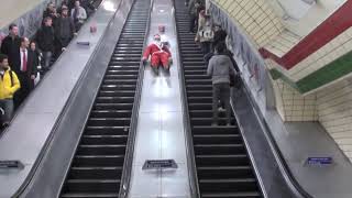 Sliding Down The London Underground Escalators As Santa Claus  quotSantas Slidequot [upl. by Naerb684]