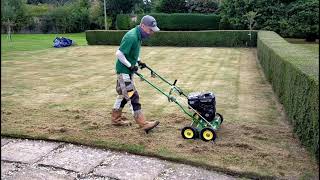 BRUTAL Lawn Scarifying  Dethatching FIXING An UGLY LAWN [upl. by Esined937]