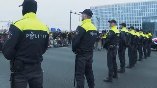 Police move climate protesters off highway in Amsterdam [upl. by Anillehs]