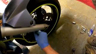 Suzuki SV650S 2006 front brake disc removal floating disc clunk [upl. by Ellehsram908]