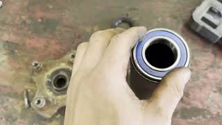 Honda Rancher 350 400 TRX350 FM How To Replace Rear Axle Bearing Replace Rear Wheel Bearing [upl. by Decamp]