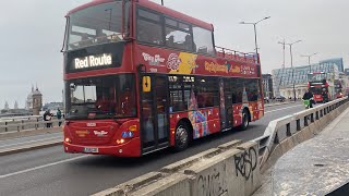 Both Scania OmniCity are Former London companies in London Bridge [upl. by Notterb]