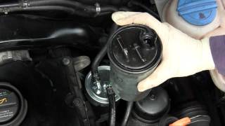 How to change the fuel filter on a VW TDI engine and Audi TDI engine DIY replacement [upl. by Enrobialc]