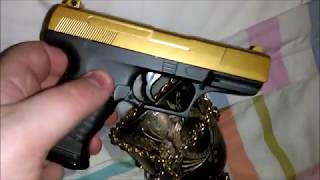 Airsoft review of the G19 springpowered P99 pistol by Galaxy with a gold slide [upl. by Amhser]