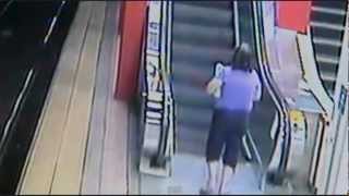 Motorized Scooter Gets Owned By the Escalator 071312 [upl. by Onitrof]