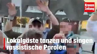 Lokalgäste tanzen und singen rassistische Parolen  kronetv NEWS [upl. by Anaihs]