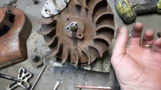 8 hp briggs and stratton rebuild removing the flywheel and revealing the points [upl. by Refannej]