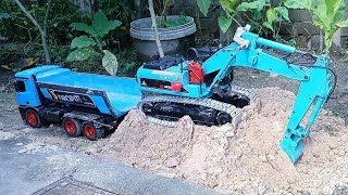 Wltoys rc excavator  Huina dump truck The work of transporting sand to the plantation area Part 2 [upl. by Phaih]