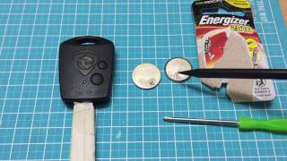 How to replace battery in key fob for Proton Persona [upl. by Roanna]