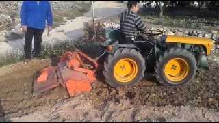 Mini tractor articulado 4X4 BJR MET 2000 tipo Pasquali Rotovator Articulated [upl. by Elfrida]