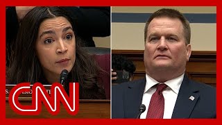 It is simple You name the crime AOC has contentious exchange with Biden probe witness [upl. by Ailugram323]