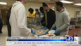 USM football players serve hot meals at Christian Services [upl. by Franklyn]