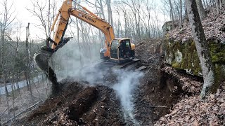 Digging in a driveway with a new excavator [upl. by Cissej583]