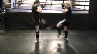 Muay Thai Round Kick Defense Drill Womens Kickboxing [upl. by Bradlee211]