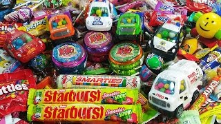 A lot of Candy Toys filled Cars  Trucks amp YoYos LEARN COLORS with Candy [upl. by Ahsinyt]