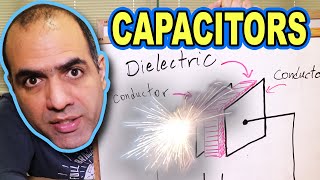 How CAPACITORS Work ElectroBOOM101006 [upl. by Jade]