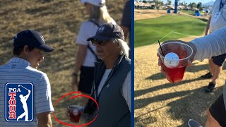 Golf ball lands in fans drink and Adam Schenk STILL makes birdie [upl. by Ecirtaeb]