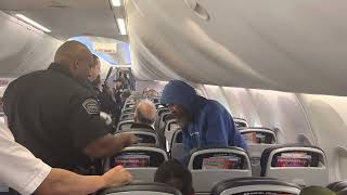 Unruly passenger removed from my plane after we were diverted back to LAX Up close experience [upl. by Cirri]