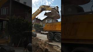 Excavator loading dump truck [upl. by Anahsohs]