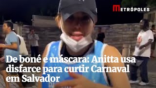 De boné e máscara Anitta usa disfarce para curtir Carnaval em Salvador [upl. by Yaya932]