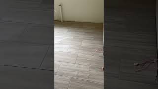 Gray Wood Plank Tile Floors tiles tile tiling construction [upl. by Adnek]