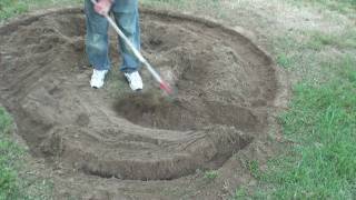 Edger trencher makes a raised landscaping bed [upl. by Nelo]