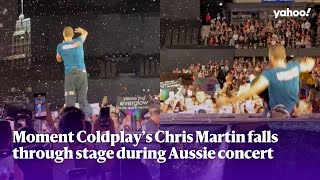 Moment Coldplay’s Chris Martin falls through stage during Aussie concert  Yahoo Australia [upl. by Eiffub]