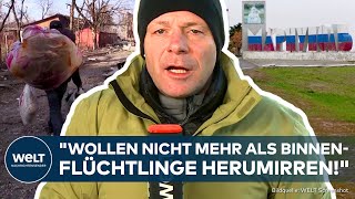 PUTINS KRIEG quotKriegsmüdequot Zehntausende Ukrainer in russisch besetztes Mariupol zurückgekehrt [upl. by Engvall]