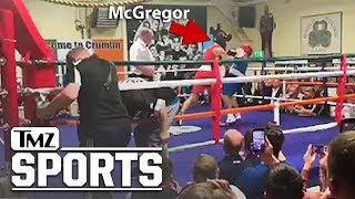 McGregor Takes A Cheap Shot In Dublin Boxing Match  TMZ Sports [upl. by Ayomat]