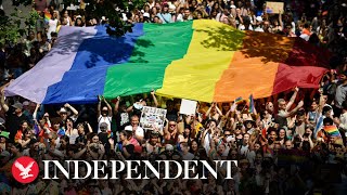 Watch again Thousands march in Paris for annual Pride parade on eve of French elections [upl. by Eekorehc]