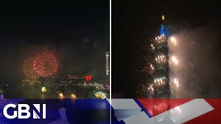 Hong Kong and Taiwan ring in 2024 with INCREDIBLE displays of fireworks [upl. by Gassman]